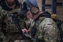 Tech. Sgt. Jeremy Miter, a 274th Air Support Operations Squadron joint terminal attack controller, controls aircraft during Exercise Bold Quest 20.2 at Muscatatuck Urban Training Center near Butlerville, Indiana, Oct. 28, 2020. Led by the Joint Staff, Bold Quest is a multinational exercise that demonstrates a joint capability to link sensors to shooters across air, land, sea, space and cyberspace.