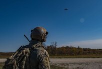 Capt. Will Boddy, 274th Air Support Operations Squadron joint terminal attack controller, controls aircraft during Exercise Bold Quest 20.2 at Camp Atterbury, Indiana, Oct. 24, 2020. Led by the Joint Staff, Bold Quest is a multinational exercise that demonstrates a joint capability to link sensors to shooters across air, land, sea, space and cyberspace.