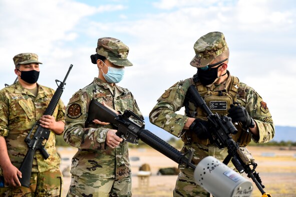 A photo of an Airman with a rifle.