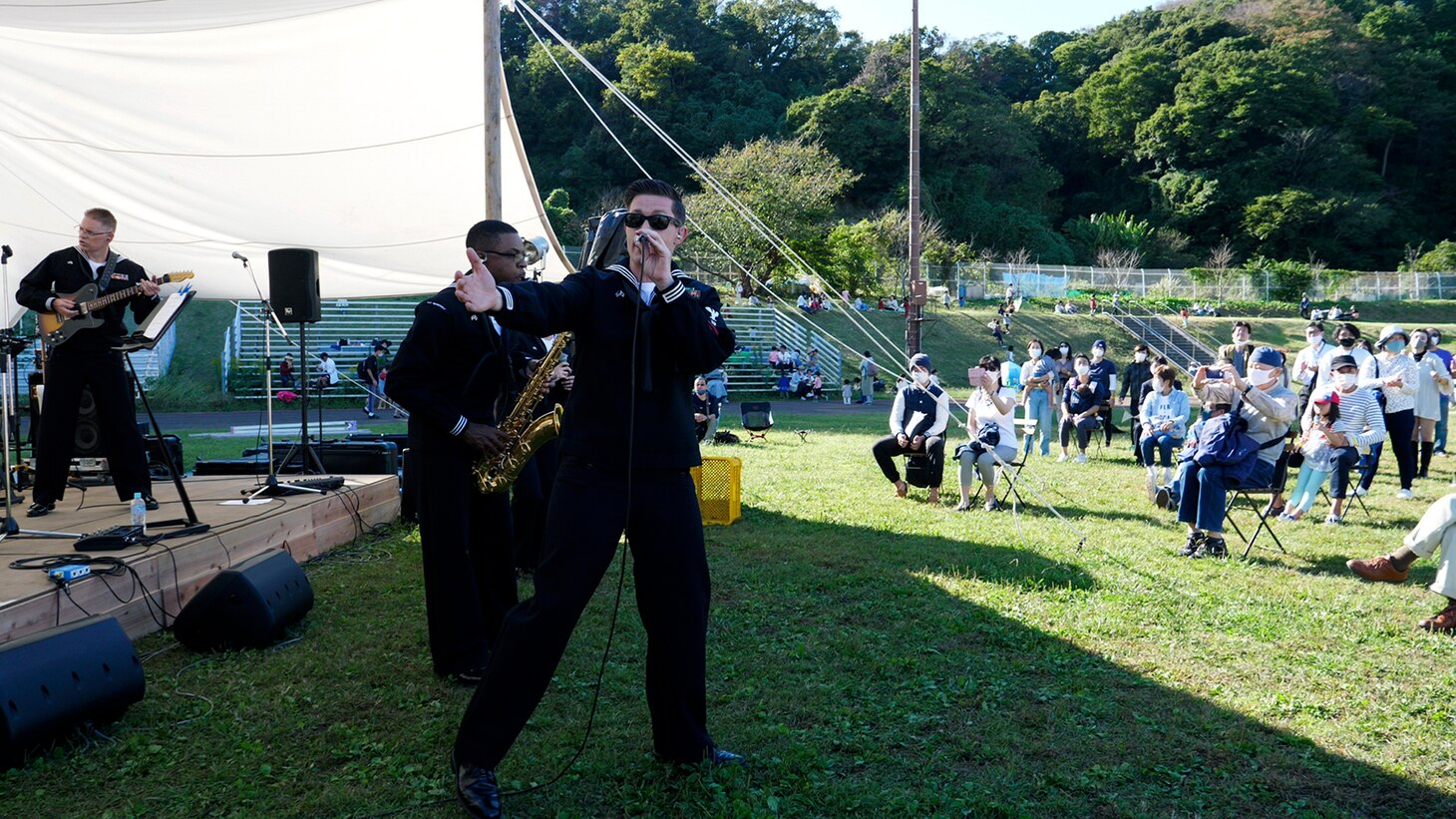 IKEGO, Japan - Musicians with the U.S. 7th Fleet Band Orient Express Popular Music Group play at the Ikego Forest Music Festival at Ikego Natural Forest Park Oct. 24, 2020. The 7th Fleet Band, established in 1948, provides musical support for ships, military bases, foreign dignitaries, and many community relations events throughout the Indo-Pacific.