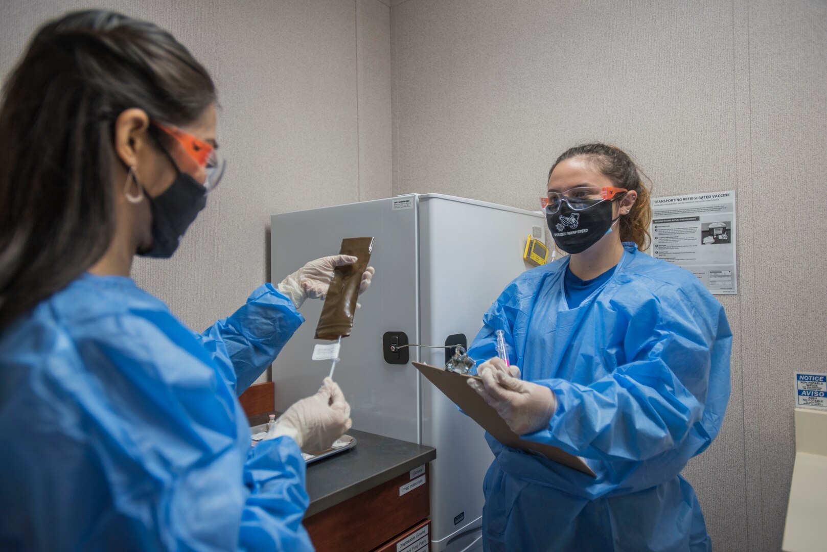 Alejandra Ornelas, Operation Warp Speed research pharmacy technician, documents and verifies whether a patient receives a vaccine or placebo, Oct. 28, 2020, at Joint Base San Antonio-Lackland, Texas. The U.S. Food and Drug Administration authorized the restart of AstraZeneca’s Phase 3 clinical trial, Oct. 26, 2020. (U.S. Air Force photo by Airman 1st Class Melody Bordeaux)