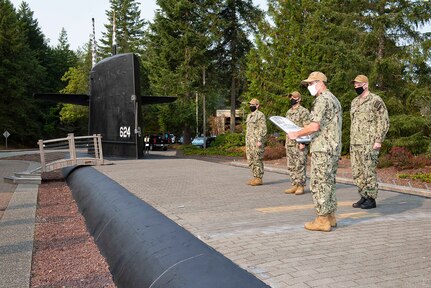 SILVERDALE, Wash. (Sept. 30, 2020) Rear Adm. Blake Converse, commander, Submarine Force, U.S. Pacific Fleet, presents The Arleigh Burke Fleet Trophy to the gold crew of USS Nebraska (SSBN 739), Sept. 30.