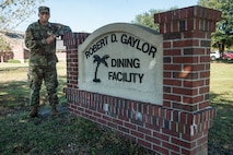 Senior Airman Joshua Cruz, 628th Force Support Squadron dining facility shift leader, stands in front of the Robert D. Gaylor Dining Facility at Joint Base Charleston, S.C., Nov. 2, 2020. Airmen and civilians who work at the dining facility work as part of a seven to 12 member team and serve meals to approximately 300 personnel during lunch hours. 628th FSS members ensure service members and civilians are fed at Joint Base Charleston, but feeding the force is just one mission that the FSS team is responsible for. The four core areas of services are food service, lodging, readiness, and fitness and sports.