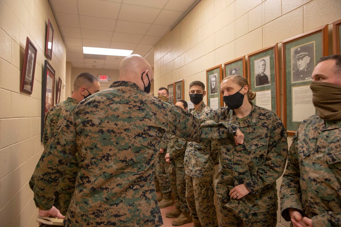The 19th Sergeant Major of the Marine Corps, Sgt. Maj. Troy E. Black, speaks with Marines attending The Basic School at Marine Corps Base Quantico, V.A., Nov. 2, 2020. During the visit Black discussed the relationship between officers and Staff Non-Commissioned officers that creates strong command teams capable of leading Marines with high morale and motivation. The Basic School educates newly commissioned or appointed officers in the high standards of professional knowledge, esprit-de-corps, and leadership to prepare them for duty in the operating forces. (U.S. Marine Corps photo by Sgt. Victoria Ross)
