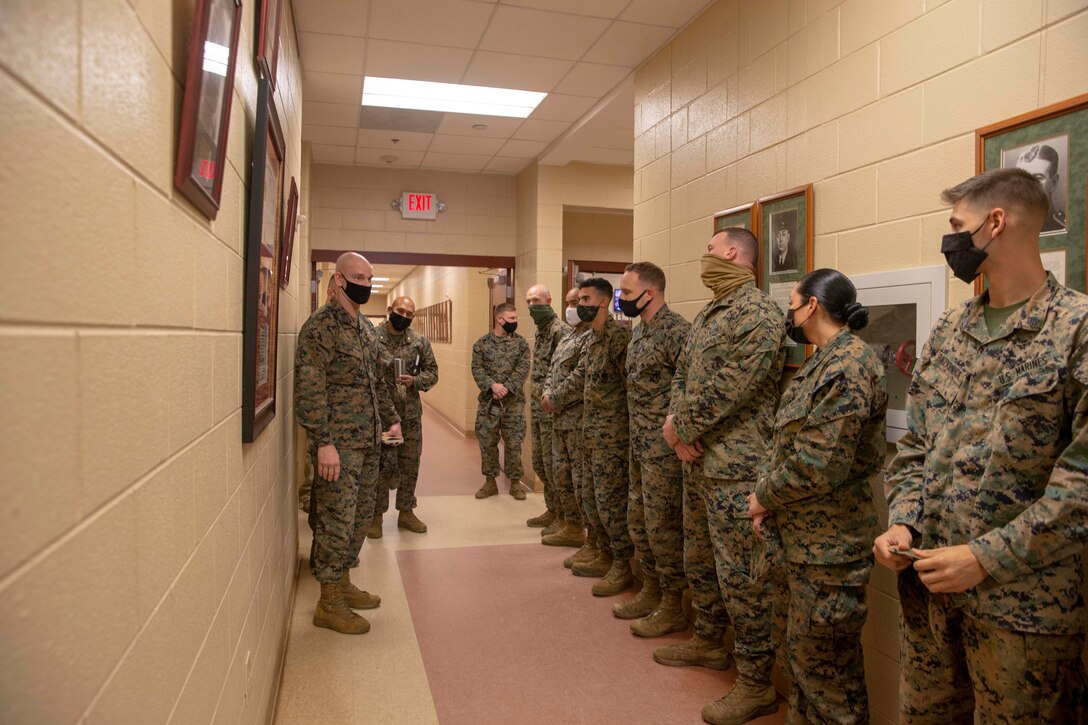 The 19th Sergeant Major of the Marine Corps, Sgt. Maj. Troy E. Black, speaks with Marines attending The Basic School at Marine Corps Base Quantico, V.A., Nov. 2, 2020. During the visit Black discussed the relationship between officers and Staff Non-Commissioned officers that creates strong command teams capable of leading Marines with high morale and motivation. The Basic School educates newly commissioned or appointed officers in the high standards of professional knowledge, esprit-de-corps, and leadership to prepare them for duty in the operating forces. (U.S. Marine Corps photo by Sgt. Victoria Ross)