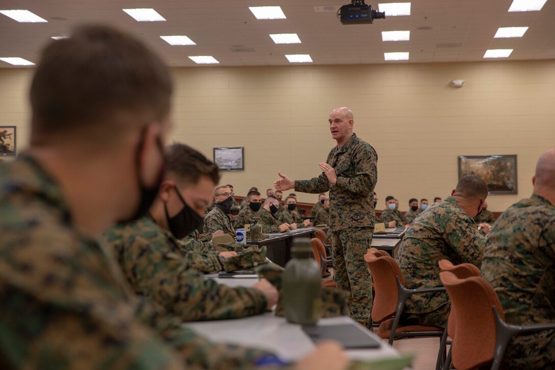 The 19th Sergeant Major of the Marine Corps, Sgt. Maj. Troy E. Black, speaks with Marines attending The Basic School at Marine Corps Base Quantico, V.A., Nov. 2, 2020. During the visit Black discussed the relationship between officers and Staff Non-Commissioned officers that creates strong command teams capable of leading Marines with high morale and motivation. The Basic School educates newly commissioned or appointed officers in the high standards of professional knowledge, esprit-de-corps, and leadership to prepare them for duty in the operating forces. (U.S. Marine Corps photo by Sgt. Victoria Ross)