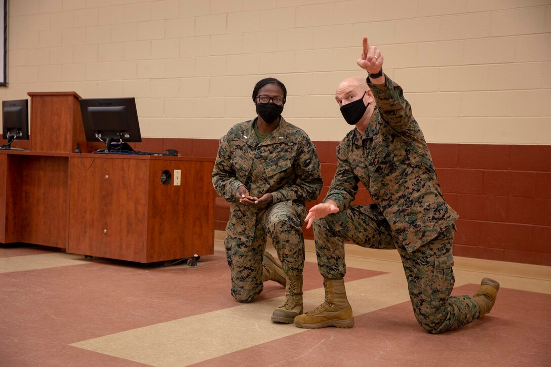 The 19th Sergeant Major of the Marine Corps, Sgt. Maj. Troy E. Black, speaks with Marines attending The Basic School at Marine Corps Base Quantico, V.A., Nov. 2, 2020. During the visit Black discussed the relationship between officers and Staff Non-Commissioned officers that creates strong command teams capable of leading Marines with high morale and motivation. The Basic School educates newly commissioned or appointed officers in the high standards of professional knowledge, esprit-de-corps, and leadership to prepare them for duty in the operating forces. (U.S. Marine Corps photo by Sgt. Victoria Ross)
