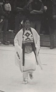 Mary Lohnes at 18, wearing traditional Native American Regalia, prior to joining the Army.