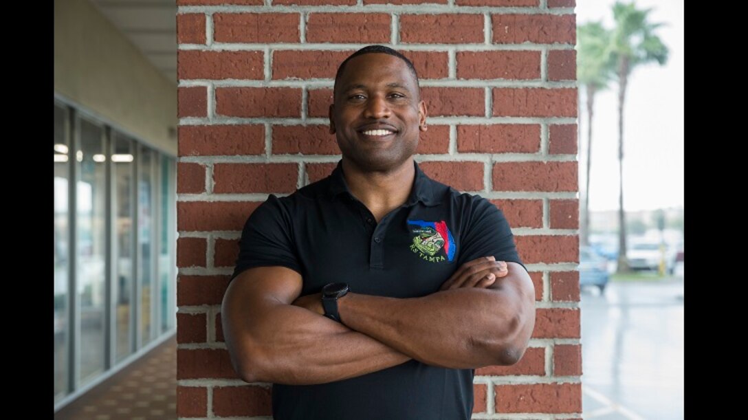 Staff Sgt. Absalom Johnson, a canvassing recruiter with Recruiting Substation Port Richey, Recruiting Station Tampa, helps young men and women join the Marine Corps at Port Richey, Florida, Aug. 21, 2020. RS Tampa is responsible for finding and preparing young men and women for the rigors of recruit training aboard Marine Corps Recruit Depot Parris Island, South Carolina. (U.S. Marine Corps photo by Sgt. Calvin Shamoon)