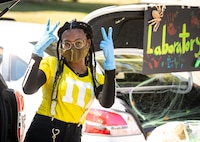 Airman Jonnica Blaylock, a Barksdale volunteer, poses for a photo during the Trunk or Treat event at Barksdale Air Force Base, La., Oct. 31, 2020.