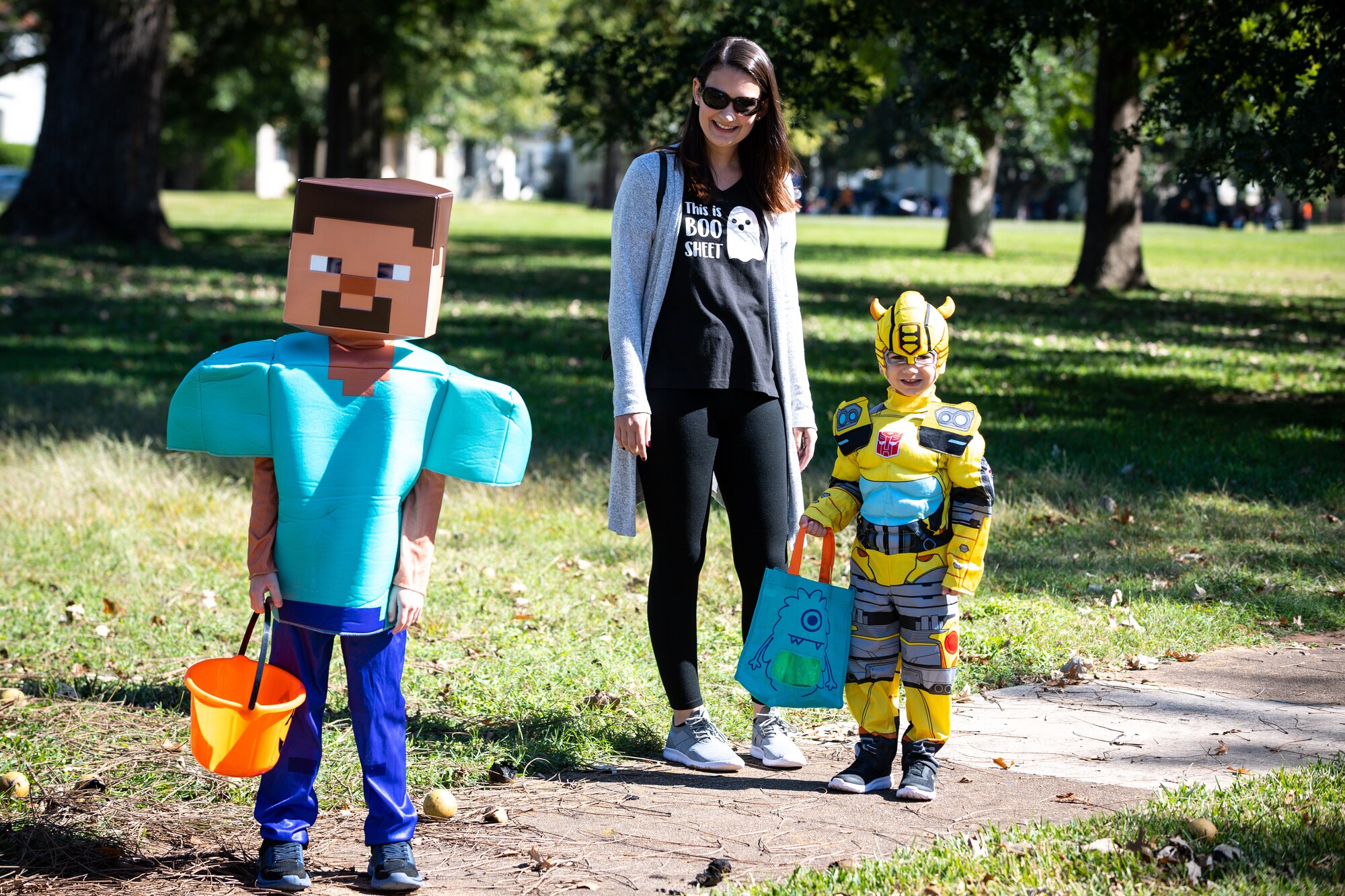 Members of the Barksdale community pose for a photo during the Trunk or Treat event at Barksdale Air Force Base, La., Oct. 31, 2020.