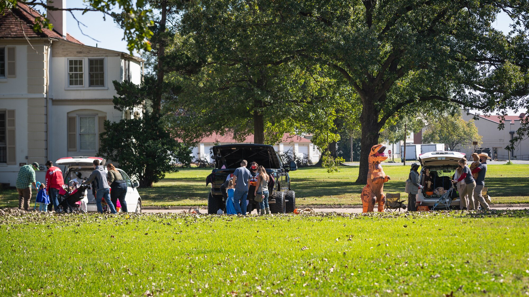 Members of the Barksdale community walk from car to car during the Trunk or Treat event at Barksdale Air Force Base, La., Oct. 31, 2020.