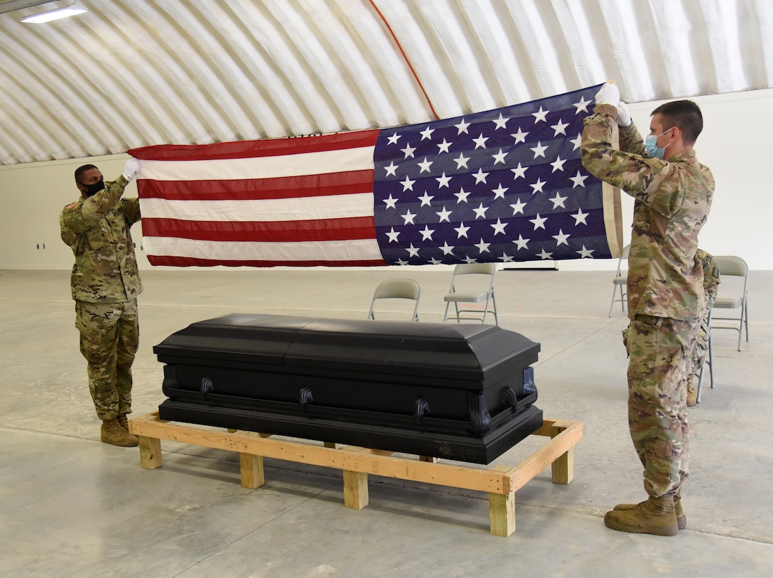 Virginia National Guard Soldiers assigned to the VNG Military Funeral Honors Program conduct a training session Oct. 22, 2020, at the State Military Reservation in Virginia Beach, Virginia.