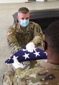 Virginia National Guard Soldiers assigned to the VNG Military Funeral Honors Program conduct a training session Oct. 22, 2020, at the State Military Reservation in Virginia Beach, Virginia.