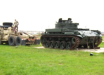 Virginia National Guard Soldiers from the Maneuver Area Training Equipment Site at Fort Pickett, Virginia, help move a historic M42 Duster into a permanent display spot Oct. 28, 2020, outside of the Sgt. Bob Slaughter Headquarters at Defense Supply Center Richmond, Virginia.