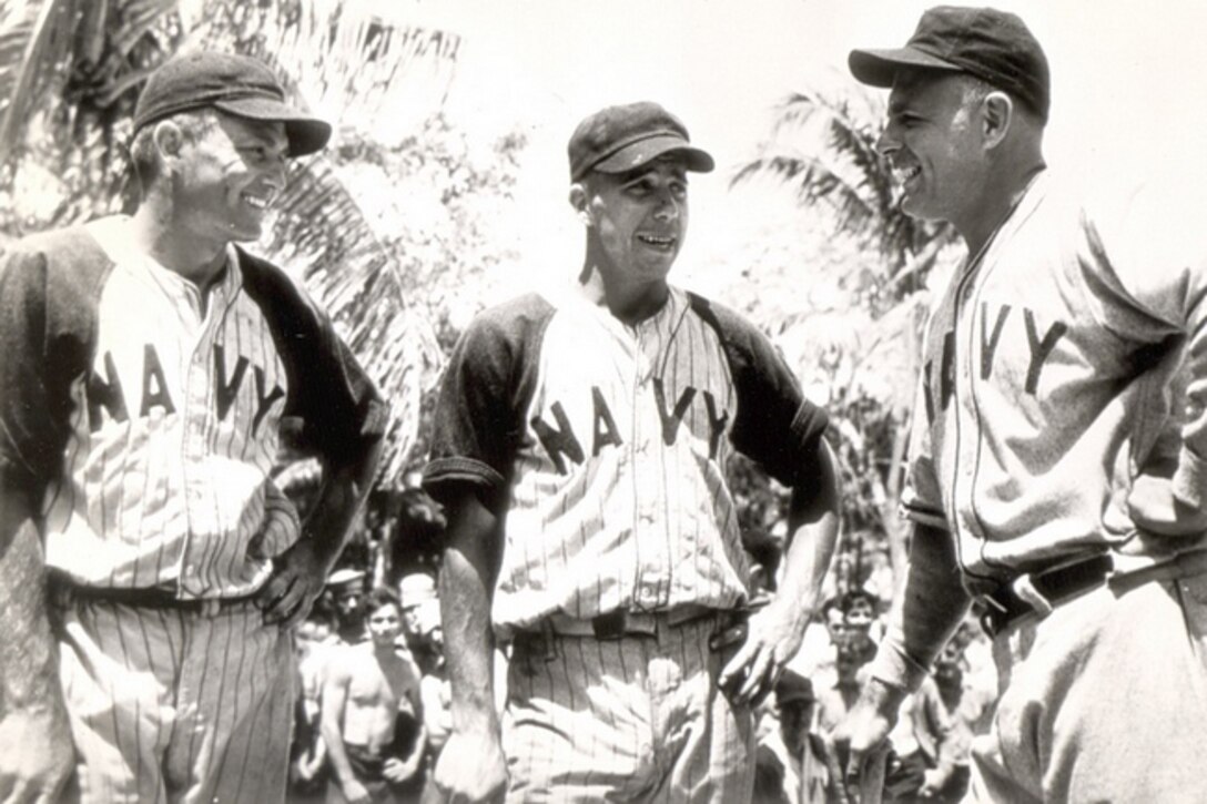 Baseball players chat.