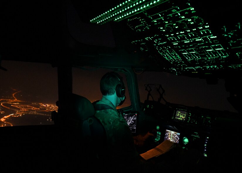 Lt. Col. Jonathan Baize, a C-17 Globemaster III pilot and 15th Airlift Squadron commander, flies a C-17 over Kuwait after taking off from Ali Al Salem Air Base, Kuwait, Oct. 30, 2020. Airmen assigned to the 15th AS replaced Airmen assigned to the 16th AS, who were returning home after a 90-day deployment. Both squadrons fly and operate C-17s assigned to the 437th Airlift Wing located at Joint Base Charleston, S.C.