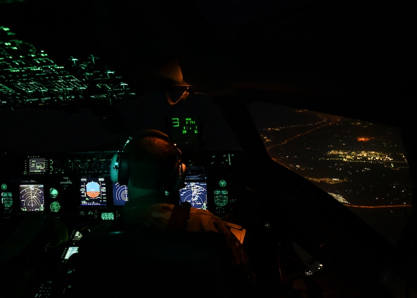 Lt. Col. James Long, a C-17 Globemaster III pilot and 16th Airlift Squadron commander, flies a C-17 over Qatar, Oct. 30, 2020. Airmen assigned to the 15th AS, replaced Airmen assigned to the 16th AS, who were returning home after a 90-day deployment. Both squadrons fly and operate C-17s assigned to the 437th Airlift Wing located at Joint Base Charleston, S.C.