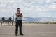 A photo of an Airman doing pre-flight inspections