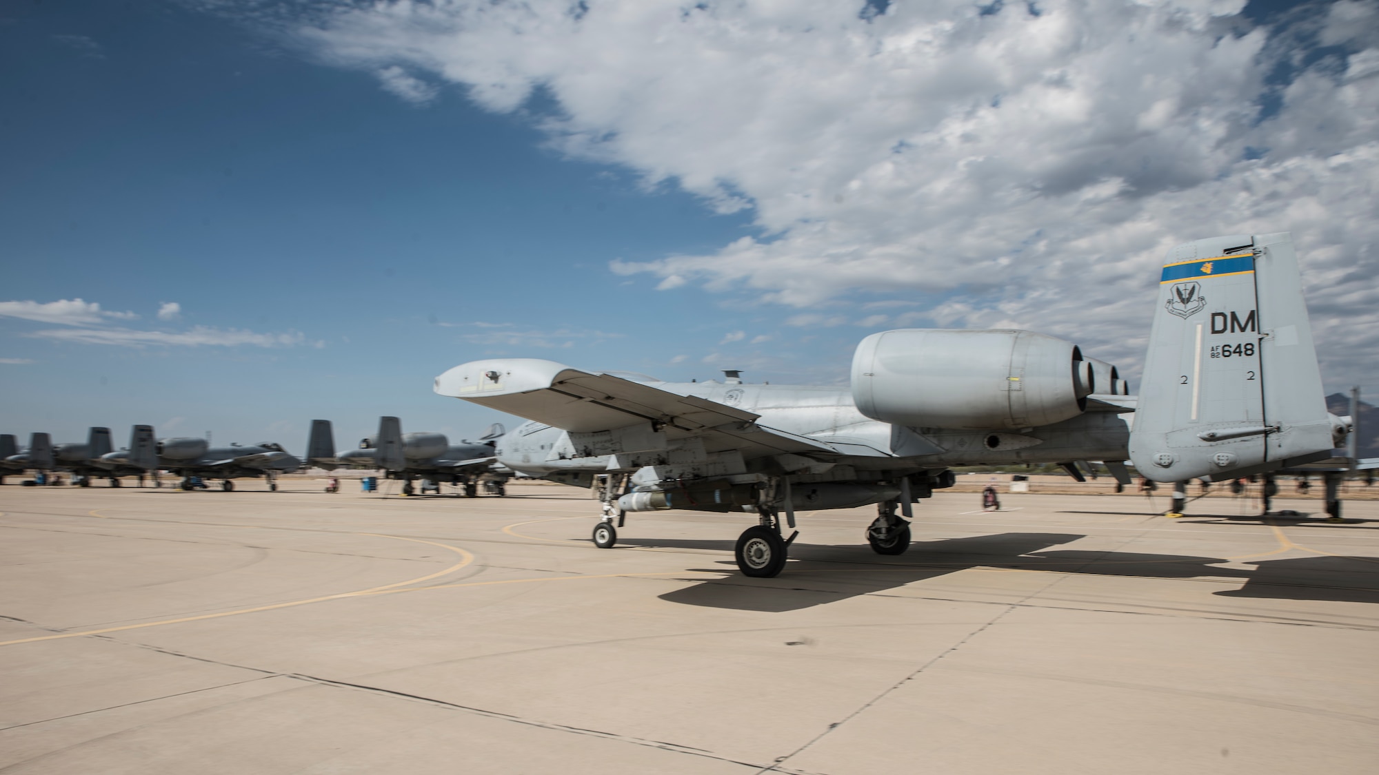 A photo of an Airman doing pre-flight inspections
