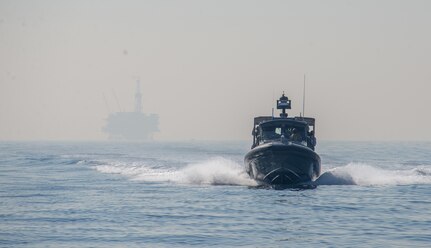 Sailors underway aboard a Sea Ark 34-foot patrol boat during a security site survey off the coast of Long Beach in California in preparation for Maritime Infrastructure Protection Exercise.