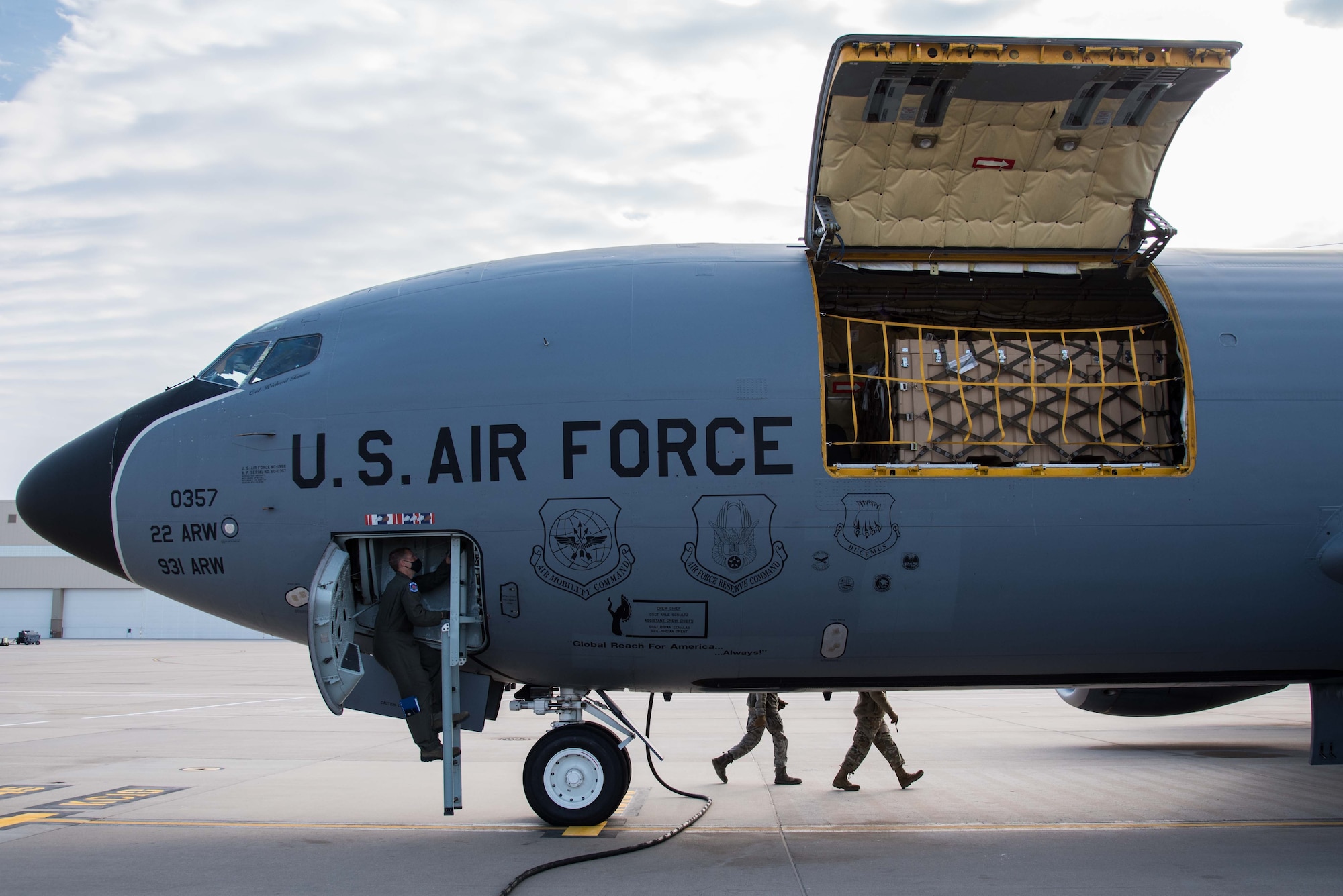 Lt. Col. Jacob Parker, 350th Air Refueling Squadron commander, boards a KC-135 Stratotanker after performing an external preflight inspection Oct. 15, 2020, at McConnell Air Force Base, Kansas. The preflight inspection is a visual check to verify the integrity of the aircraft and ensure all aircraft pins and covers are removed. (U.S. Air Force photo by Senior Airman Alexi Bosarge)