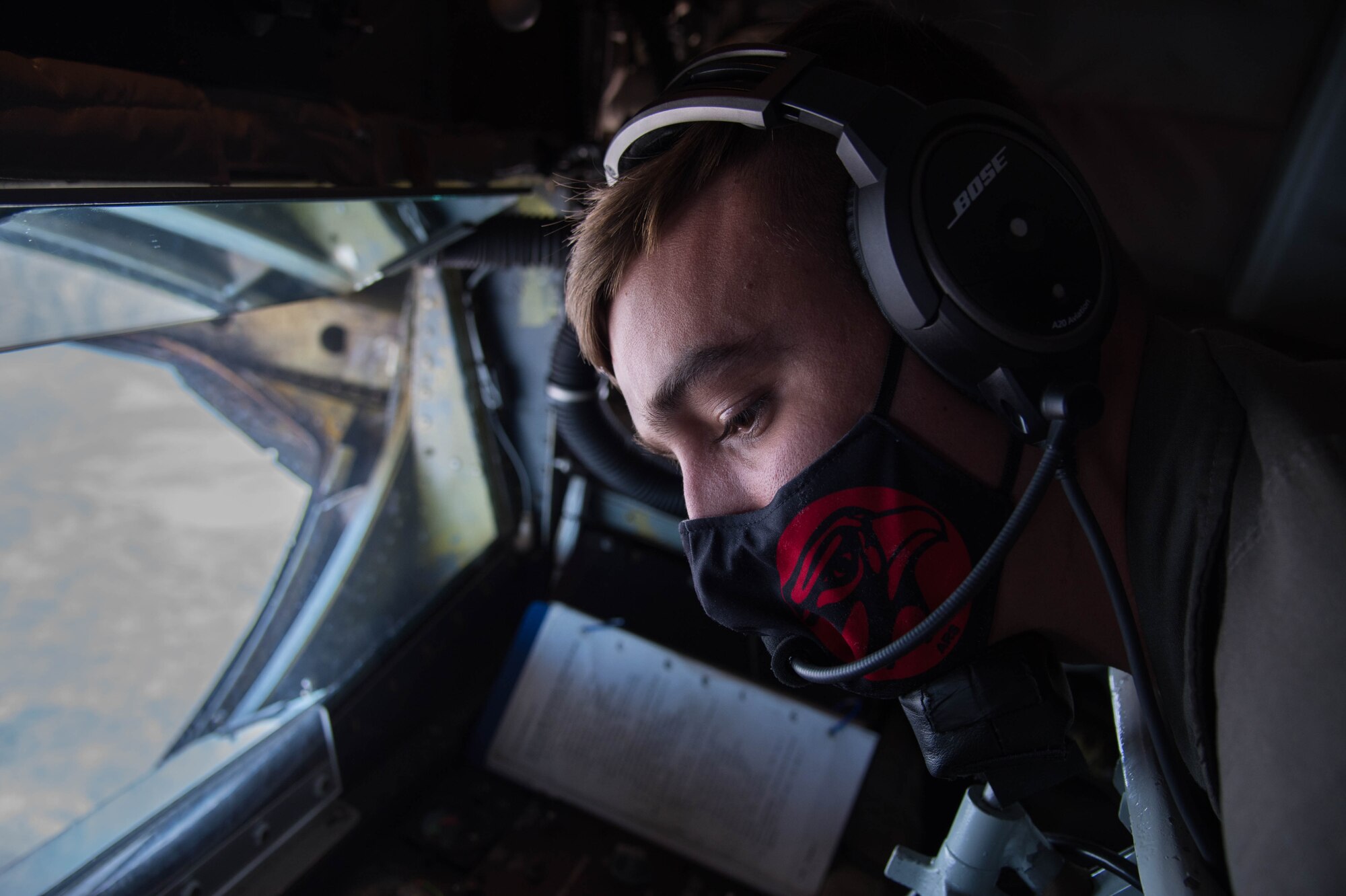 Staff Sgt. Alex Esquibel, 350th Air Refueling Squadron in-flight refueling specialist, postitions the KC-135 Stratotanker’s boom to refuel the United States Air Force Air Demonstration Squadron “Thunderbirds” Oct. 15, 2020, at McConnell Air Force Base, Kansas. The KC-135 delivered 28,000 pounds of fuel to six Thunderbirds who were en route to the Bell Fort Worth Alliance Air Show in Fort Worth, Texas. (U.S. Air Force photo by Senior Airman Alexi Bosarge)