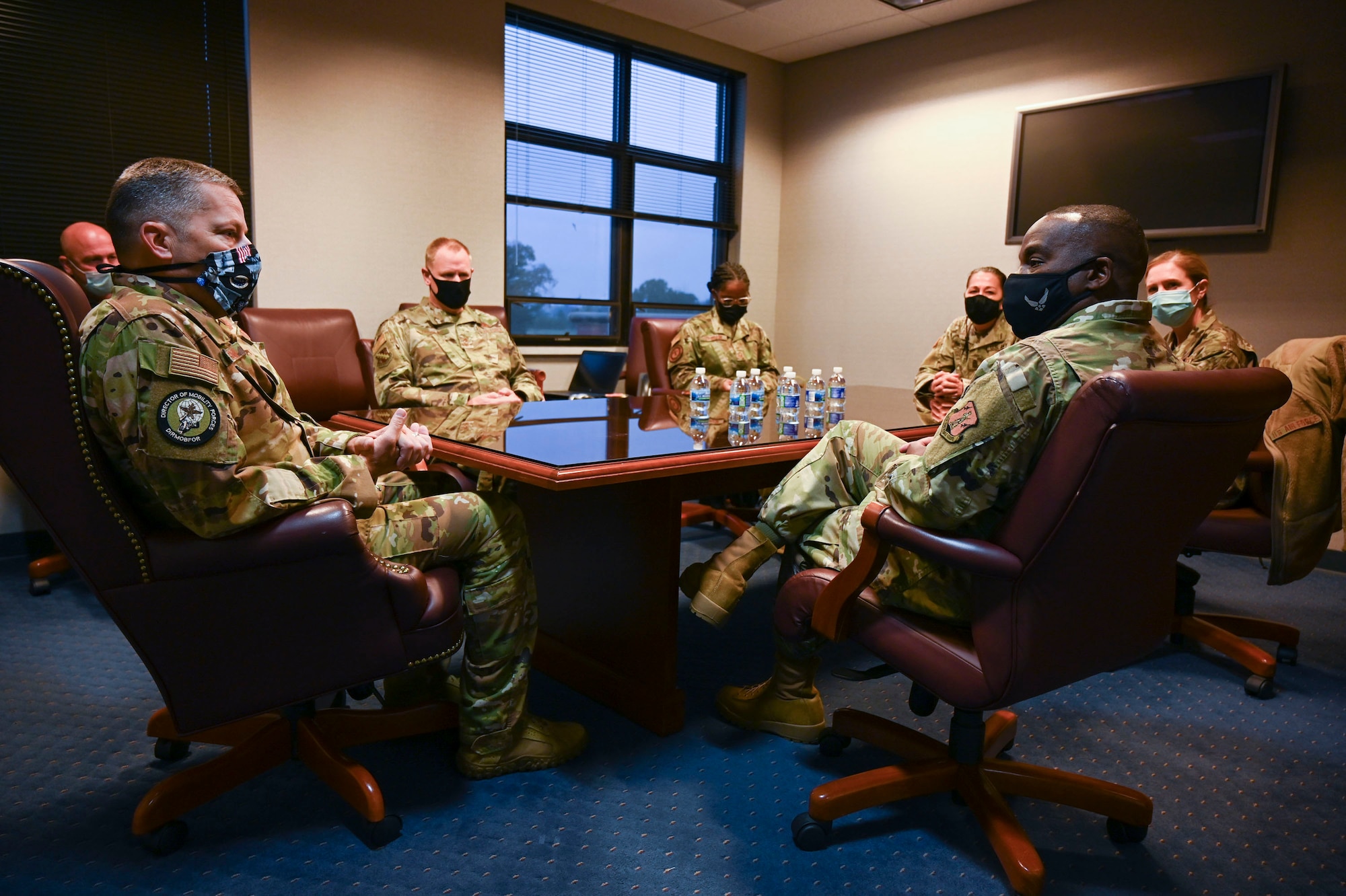 U.S. Air Force Col. Tom Jackson, commander of the 126th Air Refueling Wing, talks about the state of the wing and its Airmen with Chief Master Sgt. Maurice Williams, command chief master sergeant of the Air National Guard, at Scott Air Force Base, Illinois, Oct. 27, 2020.