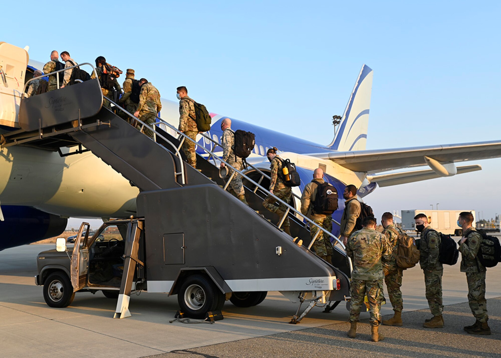 Airmen from the California Air National Guard's 144th Fighter Wing depart for Tyndall Air Force Base, FL to participate in Checkered Flag 21-1. The event is the DoD's largest fighter exercise designed to integrate fourth and fifth-generation aircraft to enhance mobility, deployment, and employment capabilities of Air Force aviators and maintainers. (Air National Guard photo by Master Sgt. Charles Vaughn)