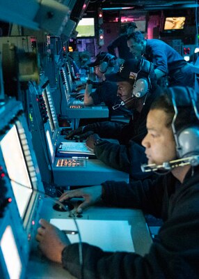 201104-N-RG171-0127 MEDITERRANEAN SEA (Nov. 4, 2020) Sailors participate in an air defense exercise in the combat information center aboard the Arleigh Burke-class guided-missile destroyer USS Donald Cook (DDG 75), Nov. 4, 2020. Donald Cook, forward-deployed to Rota, Spain, is on its 11th patrol in the U.S. Sixth Fleet area of operations in support of regional allies and partners and U.S. national security in Europe and Africa. (U.S. Navy photo by Mass Communication Specialist 3rd Class Will Hardy/Released)
