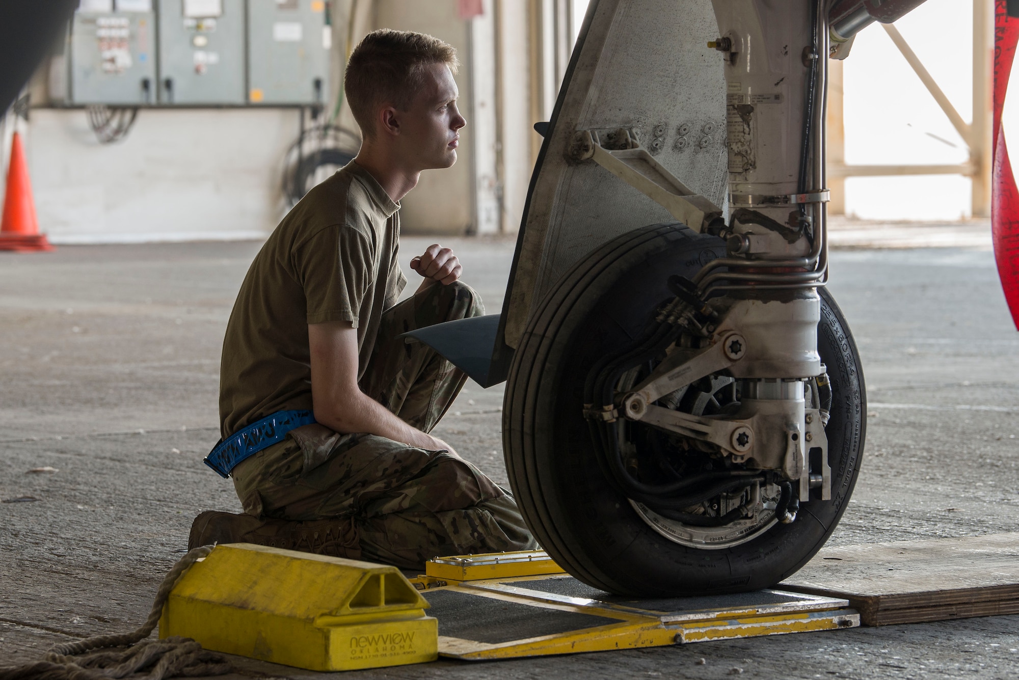 U.S. Air Force Airman 1st Class Trey Trimble, 380th Expeditionary Aircraft Maintenance Squadron crew chief, weighs an RQ-4 Global Hawk unmanned aerial vehicle following refueling at Al Dhafra Air Base, United Arab Emirates, Nov. 3, 2020.