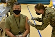 Col. John “Ryan” Bailey, commander of the U.S. Army Medical Materiel Agency, receives a flu shot during a mass vaccination clinic on Oct. 29 at Fort Detrick, Maryland. USAMMA’s Distribution Operations Center, or DOC, oversees the yearly distribution of flu vaccine for the Army, supporting active-duty and reserve Soldiers, Families, civilian employees and retirees.