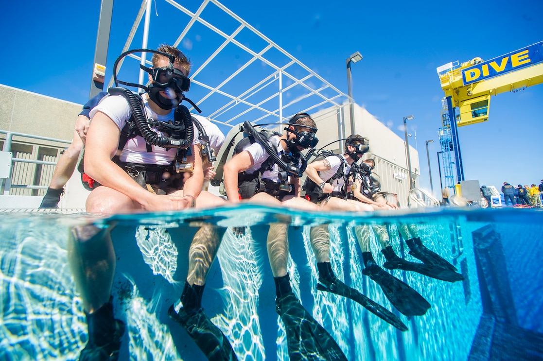 140213-N-CG436-031 PANAMA CITY, Fla. (Feb. 13, 2014) Students at Naval Diving and Salvage Training Center (NDSTC) conduct training operations in the center's 40-foot-deep Aquatic Training Facility. NDSTC, the largest diving facility in the world, trains more than 1,200 military divers from every branch of service each year. (U.S. Navy photo by Mass Communication Specialist 2nd Class Michael Scichilone)