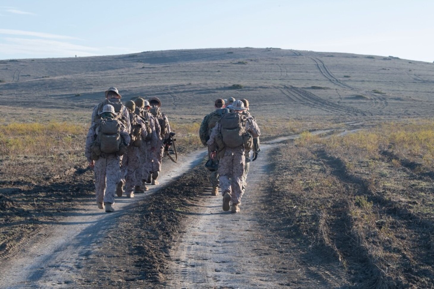 201028-N-JN605-053 SAN FERNANDO, Spain (Oct. 30, 2020) U.S. Marines with Fleet Anti-terrorism Security Company, Europe (FASTEUR), Bravo Company, 3rd Battalion, Trek through the mountains for a machine-gun shoot during joint nation exercise Lisa Azul 2020 in San Fernando, Spain, Oct. 30, 2020. Lisa Azul is joint nation exercise between the U.S. and Spanish expeditionary forces, designed to strengthen capabilities and interoperability through information exchanges and combined operations. FASTEUR is a Task Group under Navy Expeditionary Combat Forces Europe-Africa/Task Force 68, deployed to conduct crisis-response and theater-security operations in Europe and Africa. (U.S. Navy photo by Mass Communication Specialist 1st Class Petty Officer Jamica Johnson /released)