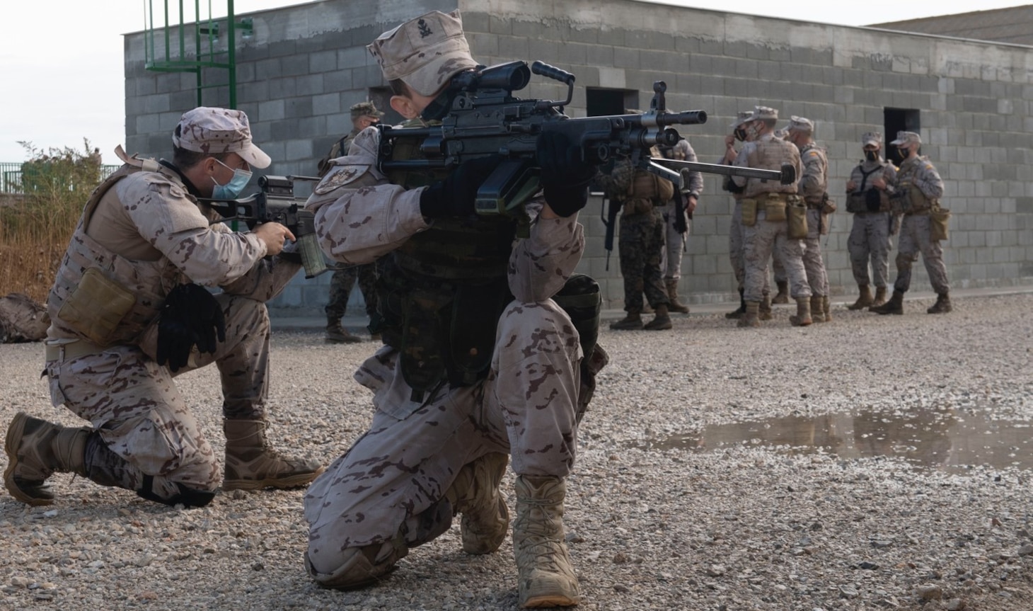 201029-N-JN605-197 SAN FERNANDO, Spain (Oct. 29, 2020) Marines with 3rd Company, 1st Battalion of the Spanish Marine Brigade conduct building clearing training during joint exercise Lisa Azul in San Fernando, Spain, Oct. 29, 2020. Lisa Azul is a joint nation exercise between the U.S. and Spanish expeditionary forces designed to strengthen capabilities and interoperability through information exchanges and combined operations. FASTEUR is a Task Group under Navy Expeditionary Combat Forces Europe-Africa/Task Force 68, deployed to conduct crisis-response and theater-security operations in Europe and Africa. (U.S. Navy photo by Mass Communication Specialist 1st Class Petty Officer Jamica Johnson /released)