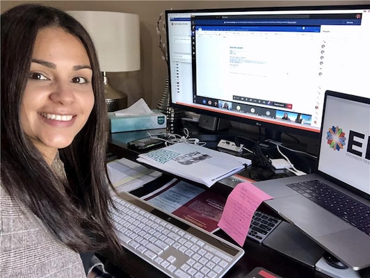 Mariely Mejas-Santiago of the Geotechnical and Structures Laboratory poses with her computer between sessions during RD20, a virtual collaborative event that was hosted Oct. 27-30 by the U.S. Army Engineer Research and Development Center. More than 755 people attended the four-day, online event.