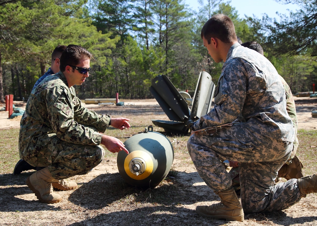 170213-N-ML022-008 EGLIN AIR FORCE BASE, Fla. (Feb. 13, 2017) A Naval School Explosive Ordnance Disposal (NAVSCOLEOD) instructor conducts training with Explosive Ordnance Disposal (EOD) students during a “day in the life of EOD” visit. NAVSCOLEOD  provides specialized, high-risk, basic and advanced EOD training to officer and enlisted personnel of all services, both U.S. and international, as well as select U.S. government personnel. (U.S. Navy photo by Mass Communication Specialist 3rd Class Brittany N. Tobin)