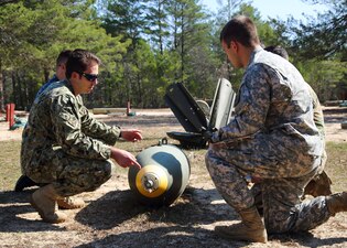 170213-N-ML022-008 EGLIN AIR FORCE BASE, Fla. (Feb. 13, 2017) A Naval School Explosive Ordnance Disposal (NAVSCOLEOD) instructor conducts training with Explosive Ordnance Disposal (EOD) students during a “day in the life of EOD” visit. NAVSCOLEOD  provides specialized, high-risk, basic and advanced EOD training to officer and enlisted personnel of all services, both U.S. and international, as well as select U.S. government personnel. (U.S. Navy photo by Mass Communication Specialist 3rd Class Brittany N. Tobin)