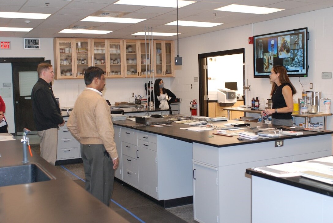 U.S. Army Engineer Research and Development Center, Construction Engineering Research Laboratory (CERL), chemist Dr. Rebekah Wilson briefs CERL’s Paint Technology Center technologies and capabilities to the Principal Deputy Assistant Secretary of the Army for Installations, Energy and Environment Bryan Gossage and CERL Acting Director Dr. Kirankumar Topudurti at the CERL in Champaign, Ill., Oct. 30, 2020.