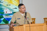 Capt. Wayne Haddad, Naval Medical Forces Atlantic regional chaplain and NMCP command chaplain, gives remarks in Naval Medical Center Portsmouth's chapel during a Voices United in Prayer event on Oct. 29.