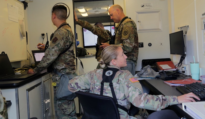 Alaska Air National Guard Capt. Roger Tran, the Nuclear Medical Science Officer for the 103rd Civil Support team, alongside Alaska Army National Guard capt. Jamie Bowden, a Medical Operations officer for the CST,  participate in a unit validation exercise in Anchorage, Aug. 4, 2020. The two Guardsmen  assisted the Alaska State Public Health laboratory during the COVID-19 pandemic from early July to mid-August(U.S. Army National Guard photo by Sgt. Seth LaCount/Released)