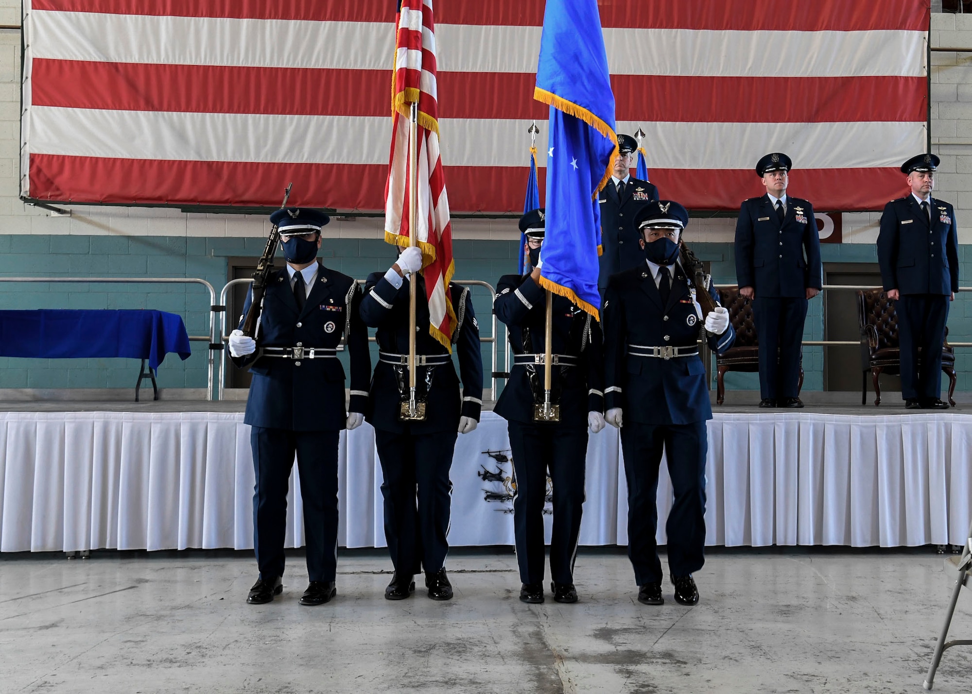 Honor Guard presents the colors.