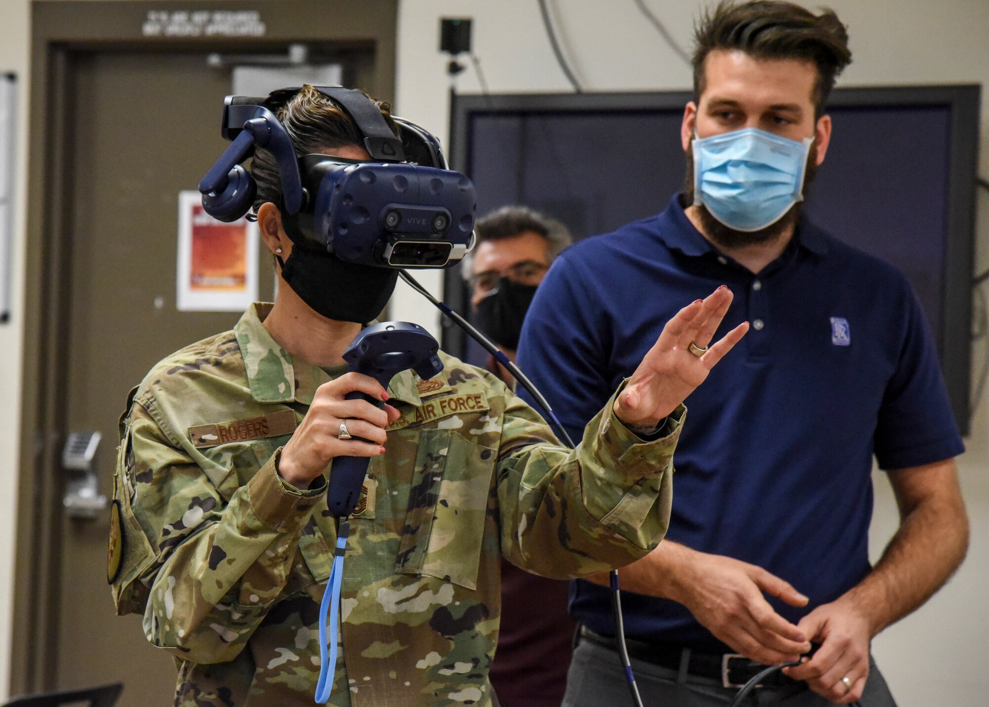Airman uses virtual reality system.