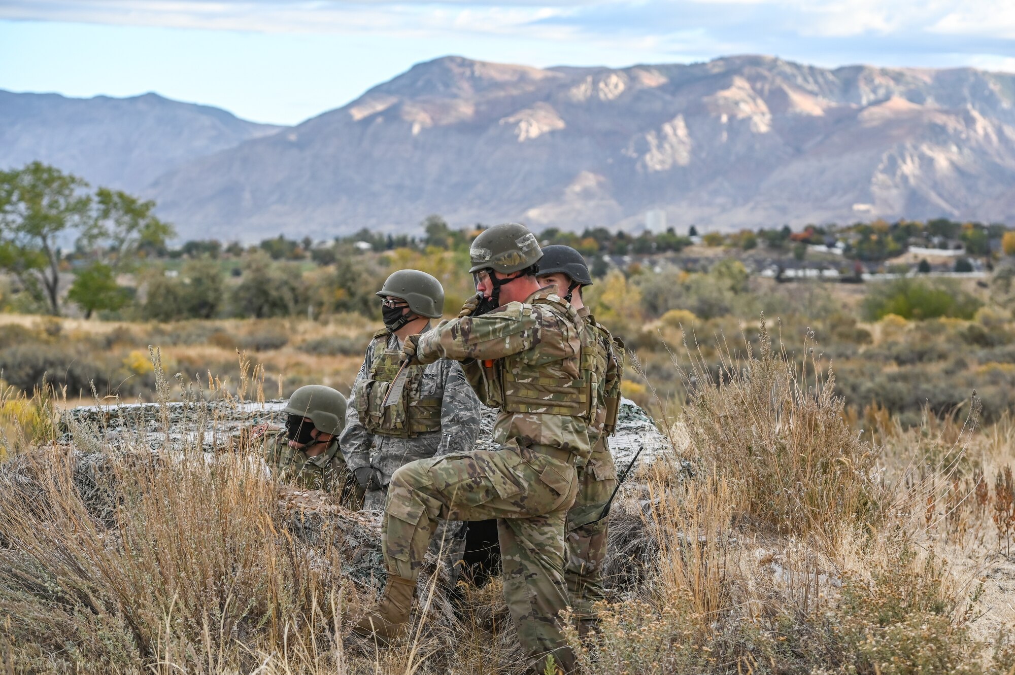 Airmen practice radio communications during a Deployment Initial Readiness Training, or DIRT, exercise Oct. 22, 2020, at Hill Air Force Base, Utah. Airmen from 729th Air Control Squadron, along with their sister unit 726th ACS from Mountain Home, Idaho, participated in the 48-hour training exercise where they were taught deployment readiness skills. (U.S. Air Force photo by Cynthia Griggs)