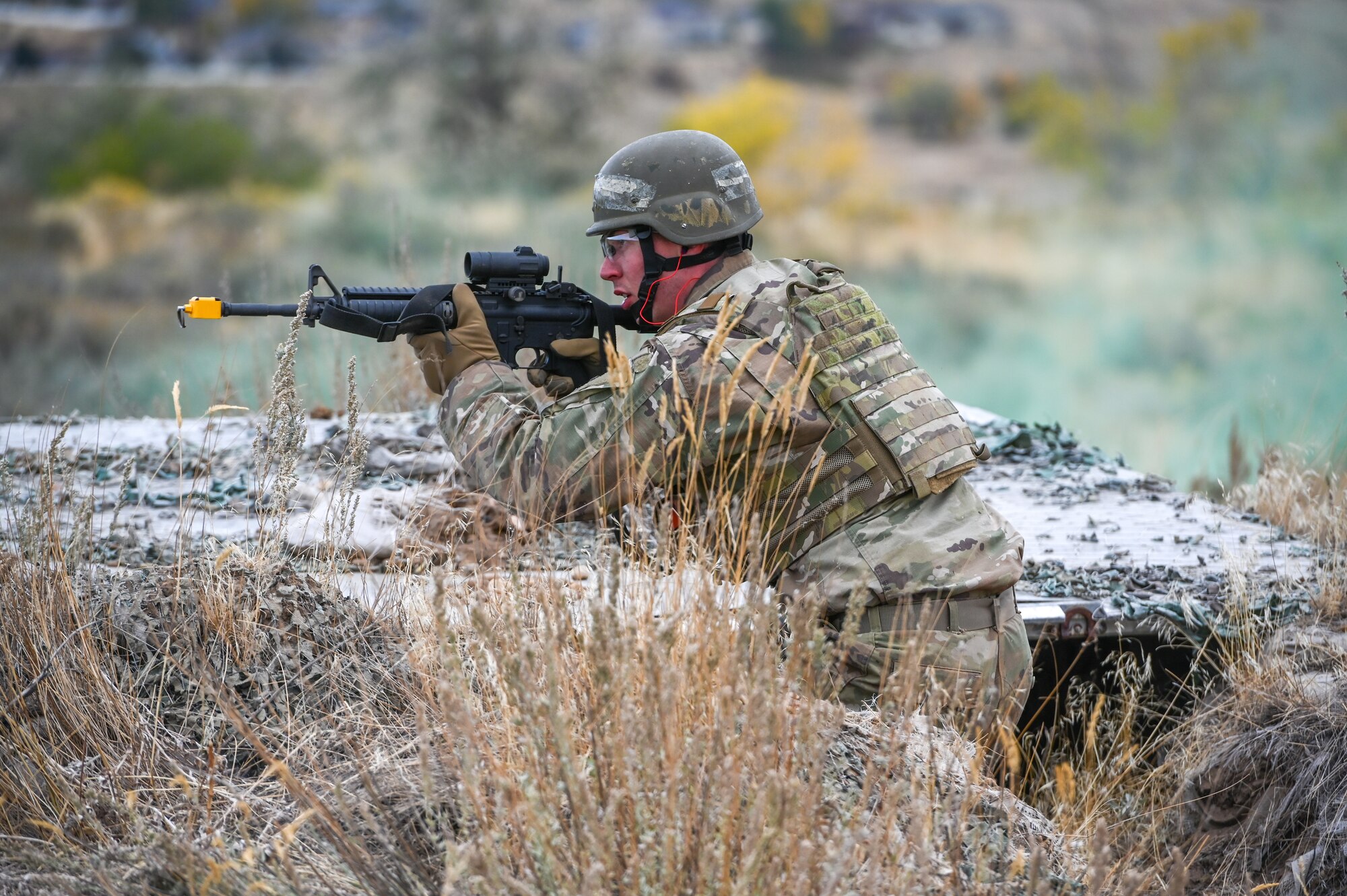 Senior Airman Wyatt Vivier, 726th Air Control Squadron out of Mountain Home, Idaho, helps set up a defensive perimeter during a Deployment Initial Readiness Training, or DIRT, exercise Oct. 22, 2020, at Hill Air Force Base, Utah. Airmen from 729th ACS, along with their sister unit 726th ACS, participated in the 48-hour training exercise where they were taught deployment readiness skills. (U.S. Air Force photo by Cynthia Griggs)