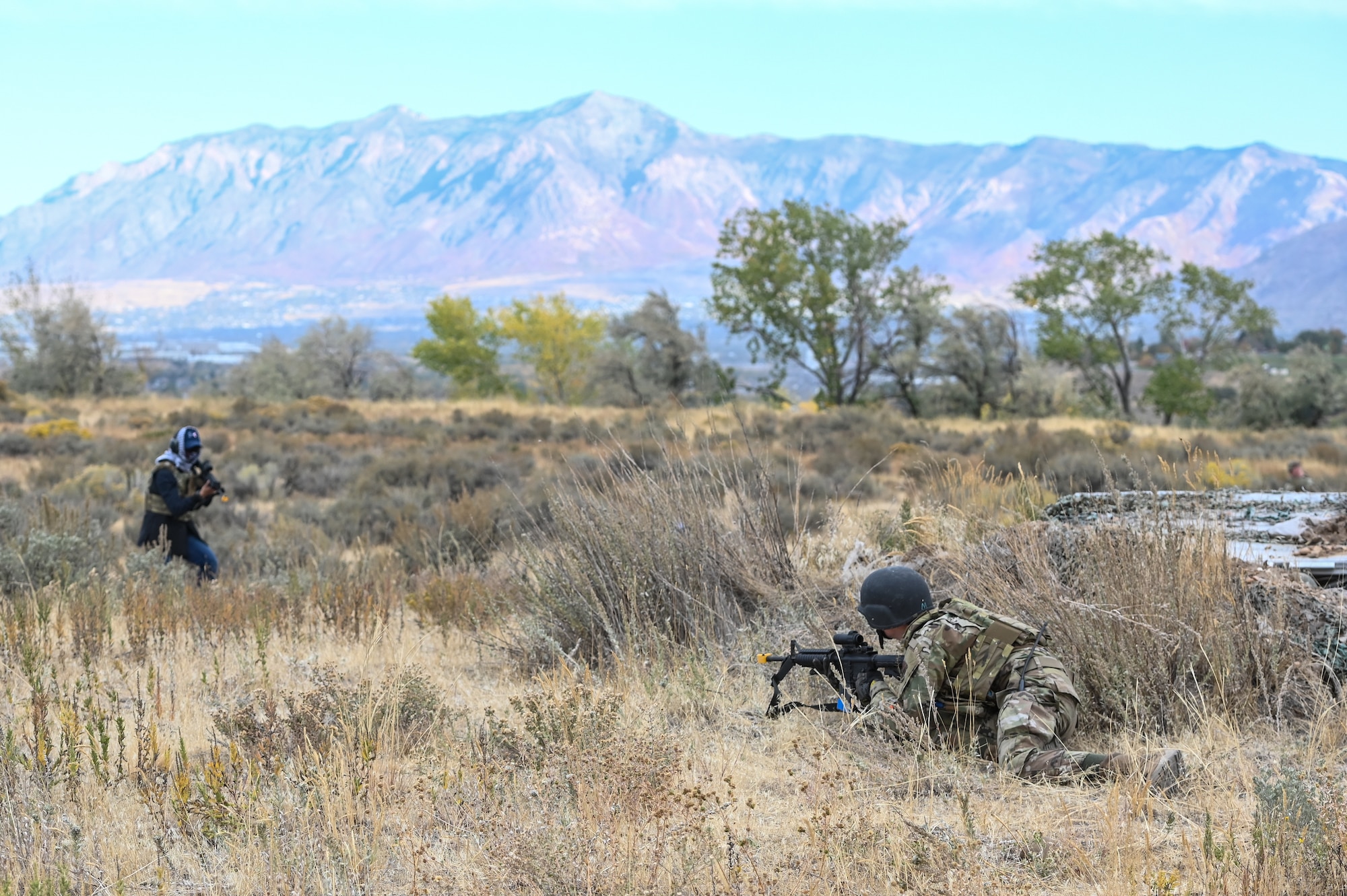 An Airman helps set up a defensive perimeter during a Deployment Initial Readiness Training, or DIRT, exercise Oct. 22, 2020, at Hill Air Force Base, Utah. Airmen from 729th ACS, along with their sister unit 726th ACS, participated in the 48-hour training exercise where they were taught deployment readiness skills. (U.S. Air Force photo by Cynthia Griggs)