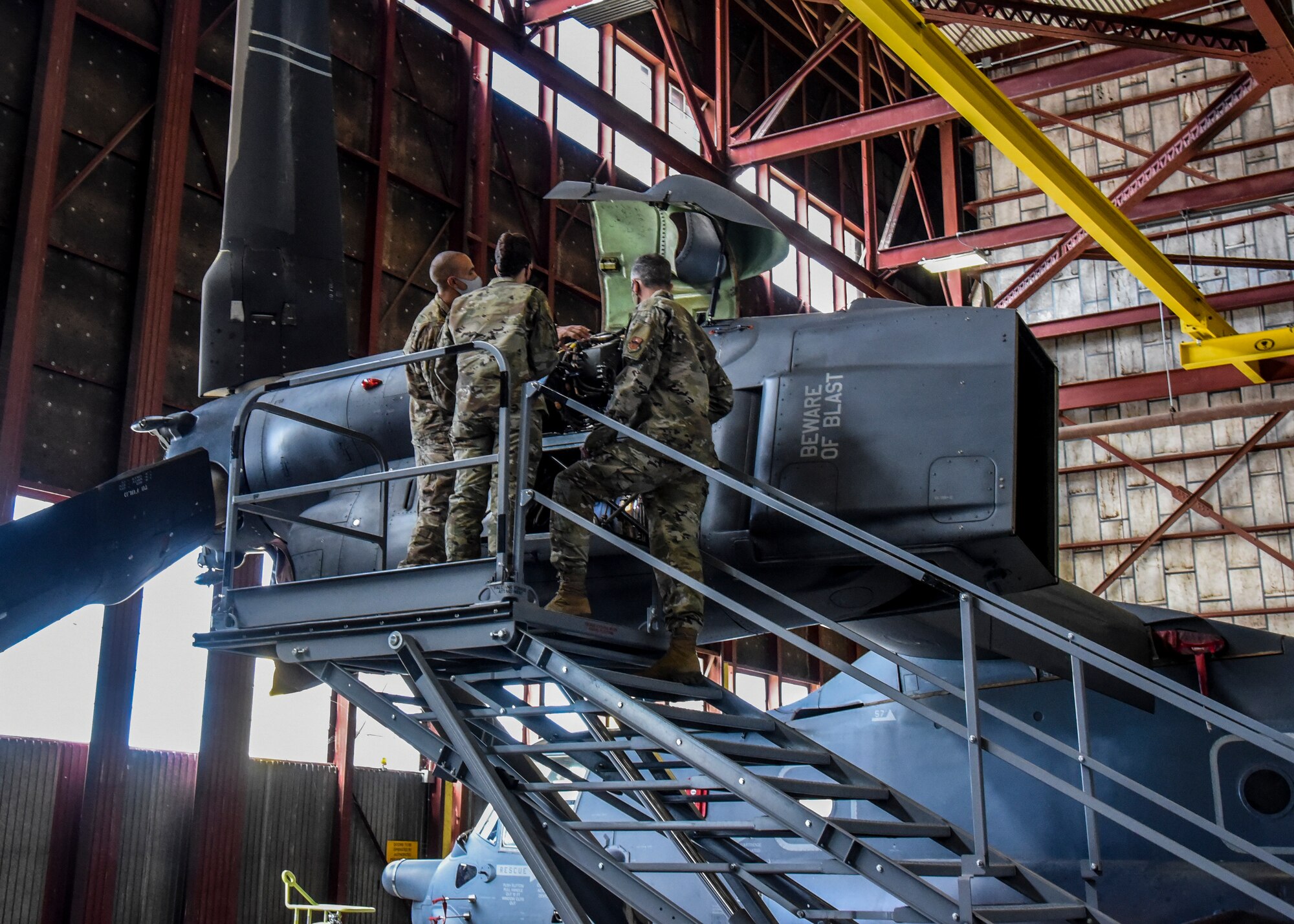 Airman demonstrating a new simulator on a CV-22.