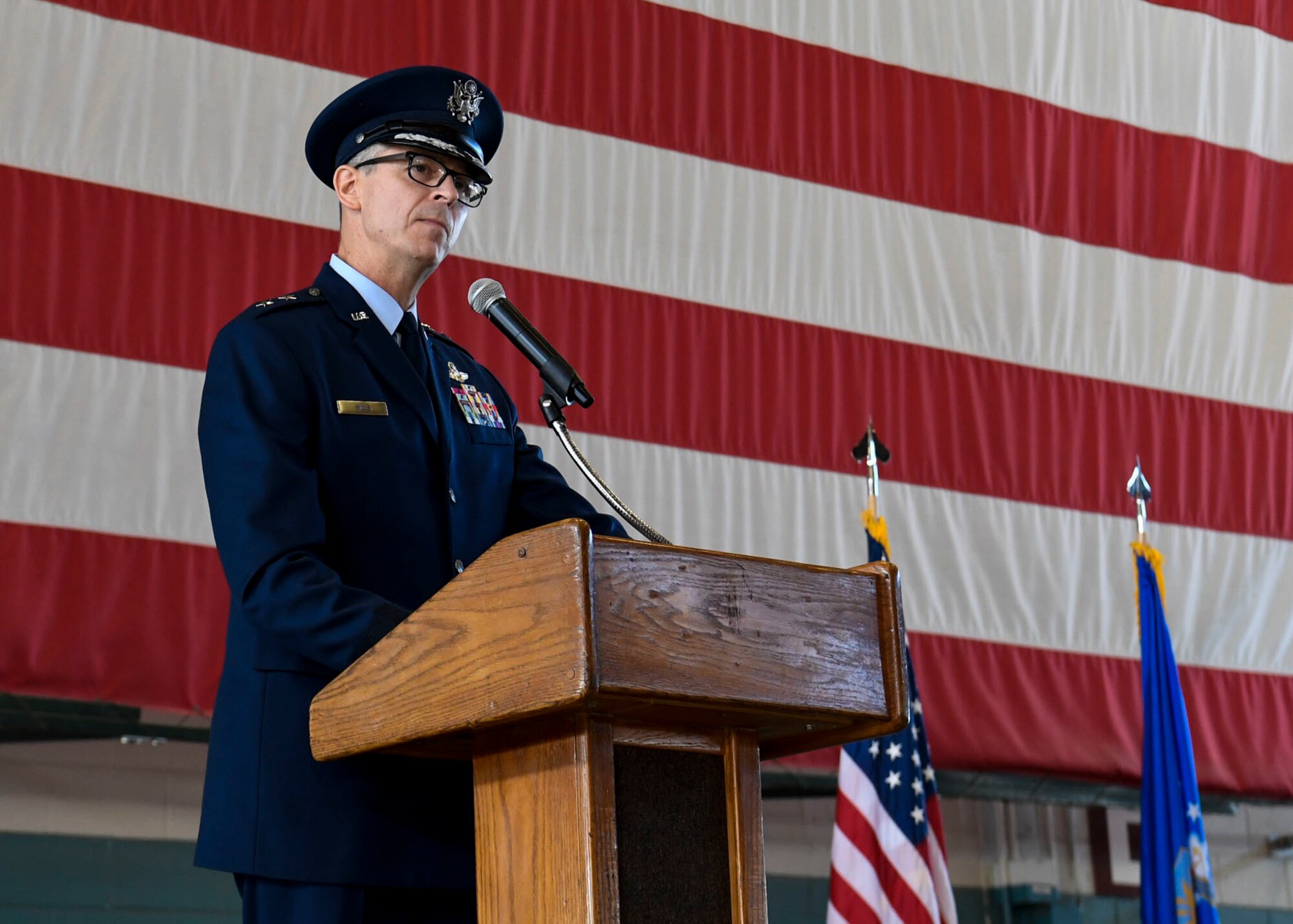 U.S. Air Force Maj. Gen. Craig D. Wills, 19th Air Force commander, speaks during a ceremony.