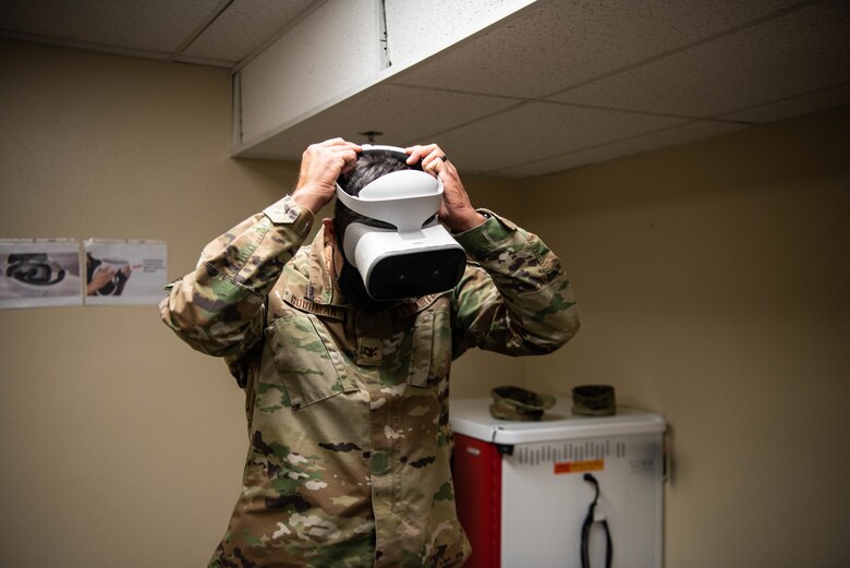 U.S. Air force Col. Richard A. Goodman, 366th Fighter Wing Commander, tries on the VR headset on Mountain Home Air Force Base, ID, Nov. 5, 2020. This program is focused on developing training videos for new Airmen who need to learn the basics of launching, recovering and refueling an aircraft. (U.S. Air Force photo by Airman 1st Class Cheyenne Bassham)