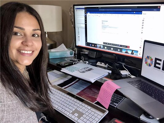 Mariely Mejas-Santiago of the Geotechnical and Structures Laboratory poses with her computer between sessions during RD20, a virtual collaborative event that was hosted Oct. 27-30 by the U.S. Army Engineer Research and Development Center. More than 755 people attended the four-day, online event.